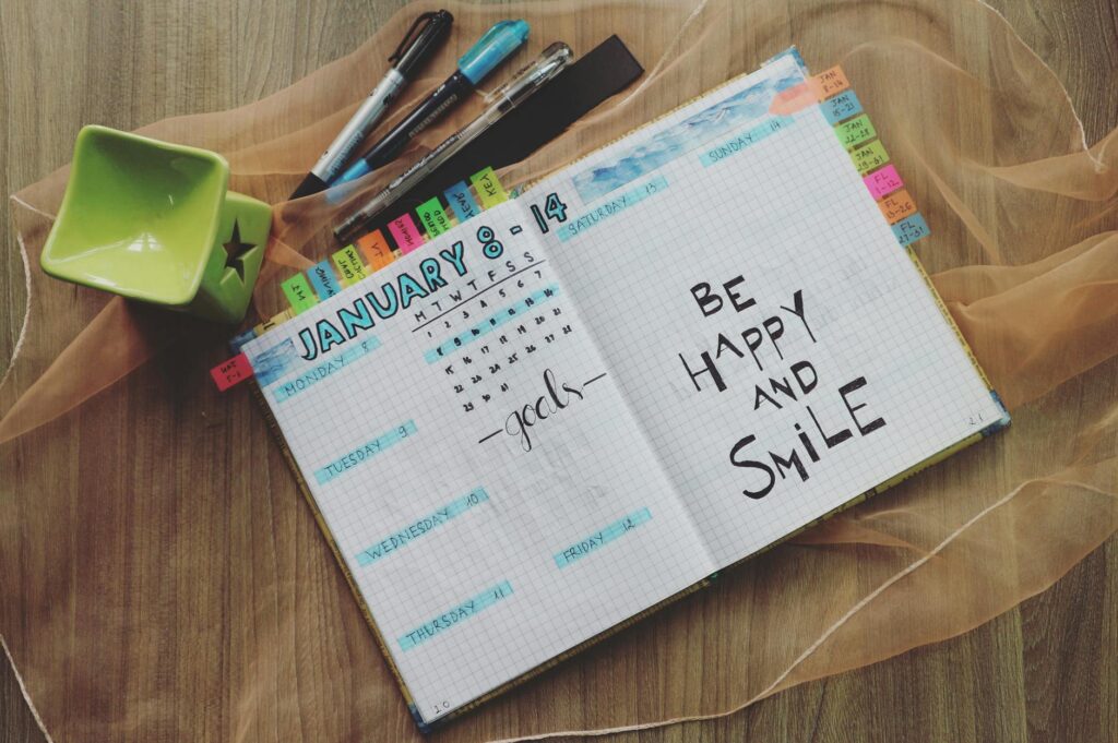 A well-organized planner open to a page filled with a Las Vegas itinerary and travel tips. — las vegas trip planner