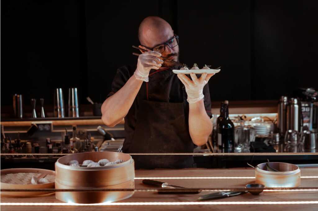 A chef preparing a unique dish in a Las Vegas restaurant, emphasizing culinary innovation. — unique dining in Las Vegas