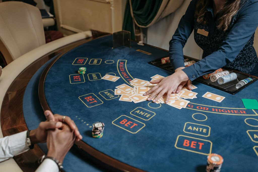 A close-up of a player tipping a dealer, highlighting the etiquette of gratitude in gambling. — Las Vegas casino etiquette