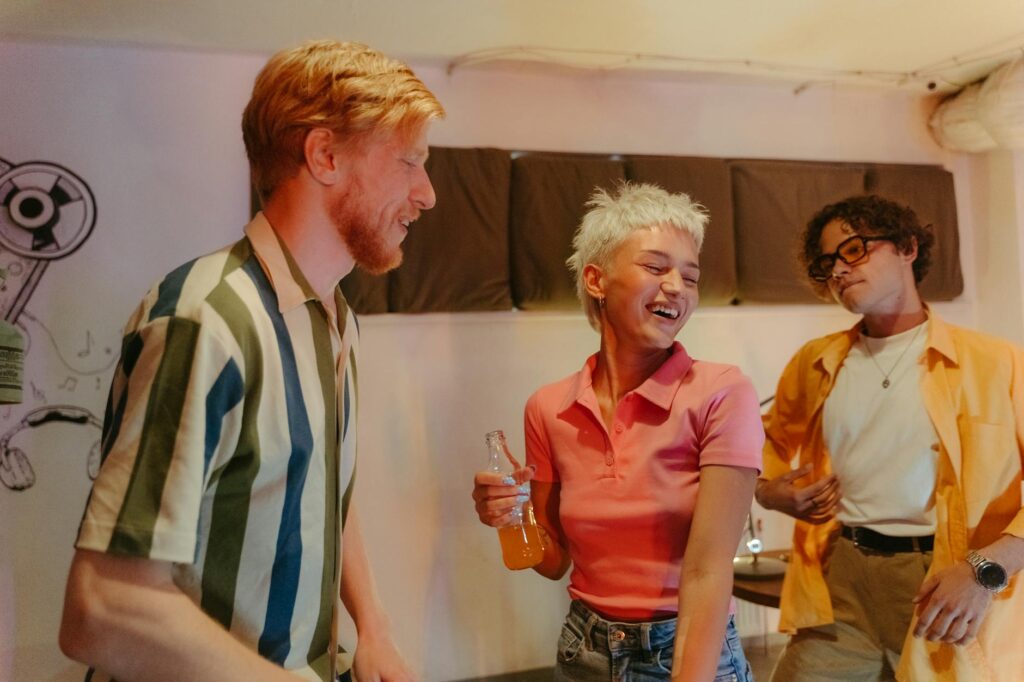 A group of friends enjoying nightlife in Las Vegas, laughing and having a great time. — Las Vegas nightlife guide