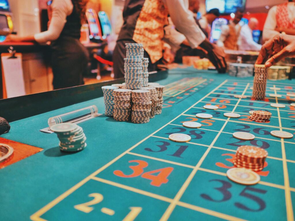 A luxurious casino floor with high stakes tables and players in action. — high roller casinos Las Vegas