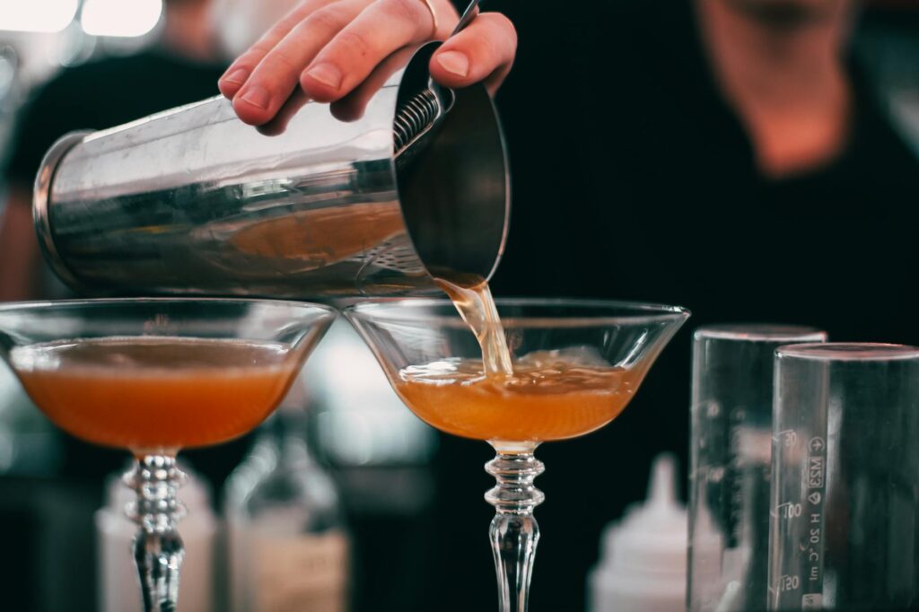 A stylish cocktail served at one of the best bars in Las Vegas, highlighting the artistry of mixology. — Las Vegas night…