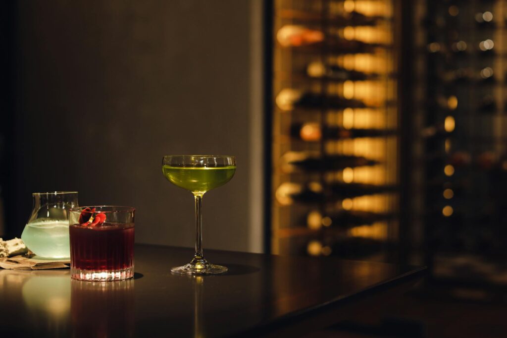 A trendy bar scene with colorful cocktails and a lively atmosphere. — Las Vegas nightlife guide 2026