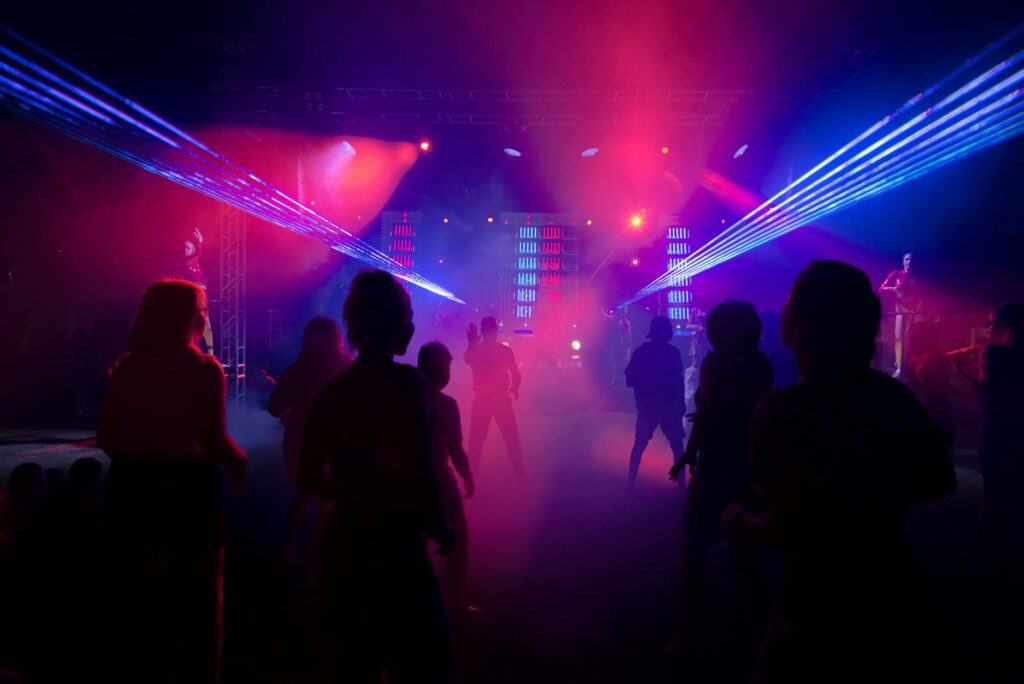 A vibrant nightclub scene in Las Vegas with people dancing and colorful lights — Las Vegas nightlife