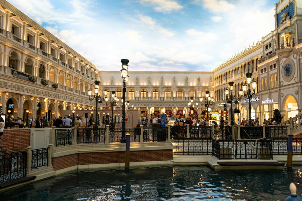 A vibrant view of the Venetian Casino showcasing its gondola rides and Italian architecture. — themed casinos Las Vegas