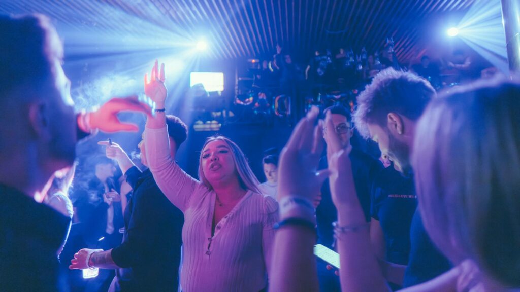 An aerial shot of a Las Vegas nightclub, filled with partygoers dancing. — Las Vegas bachelor party planning