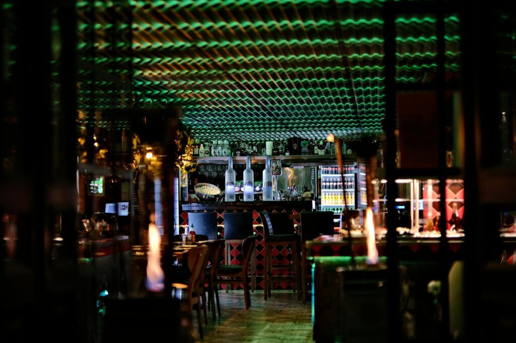 An interior shot of a trendy bar with unique cocktails, showcasing the vibrant atmosphere of Las Vegas nightlife 2026.