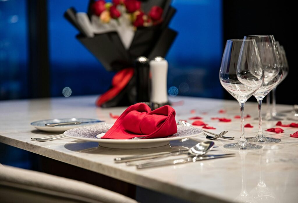 An intimate dinner setup at a romantic restaurant in Las Vegas. — romantic things to do in Las Vegas