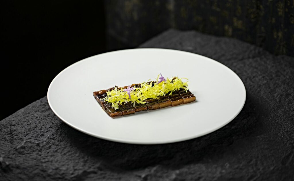 A beautifully plated dish from a Michelin-star restaurant in Las Vegas. — unique dining in Las Vegas