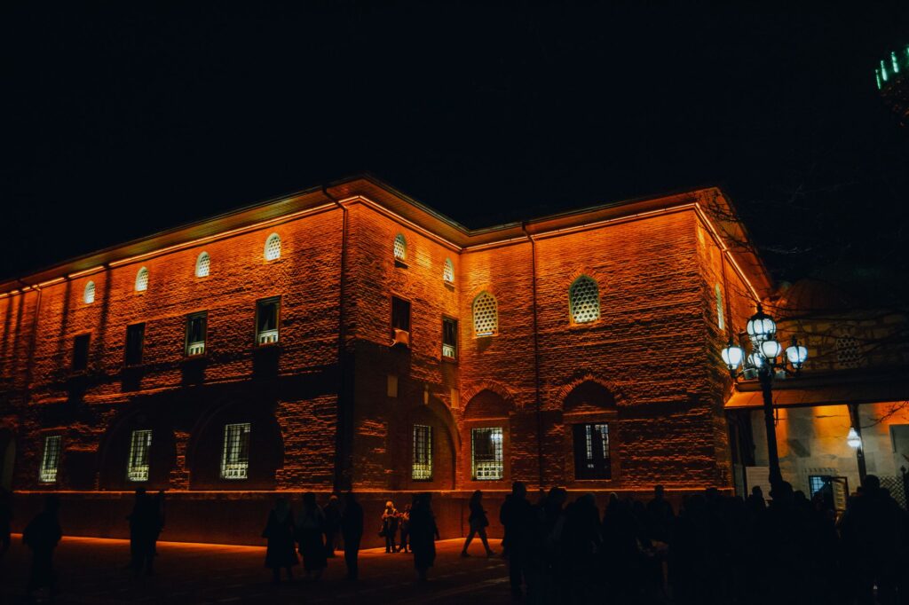 A captivating exterior view of the Mob Museum lit up at night. — unique experiences in Las Vegas