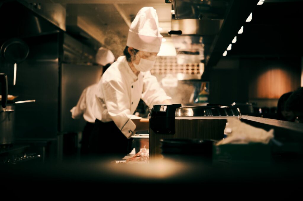 A chef preparing a meal at a new restaurant, highlighting the culinary experience. — new restaurants Las Vegas 2026