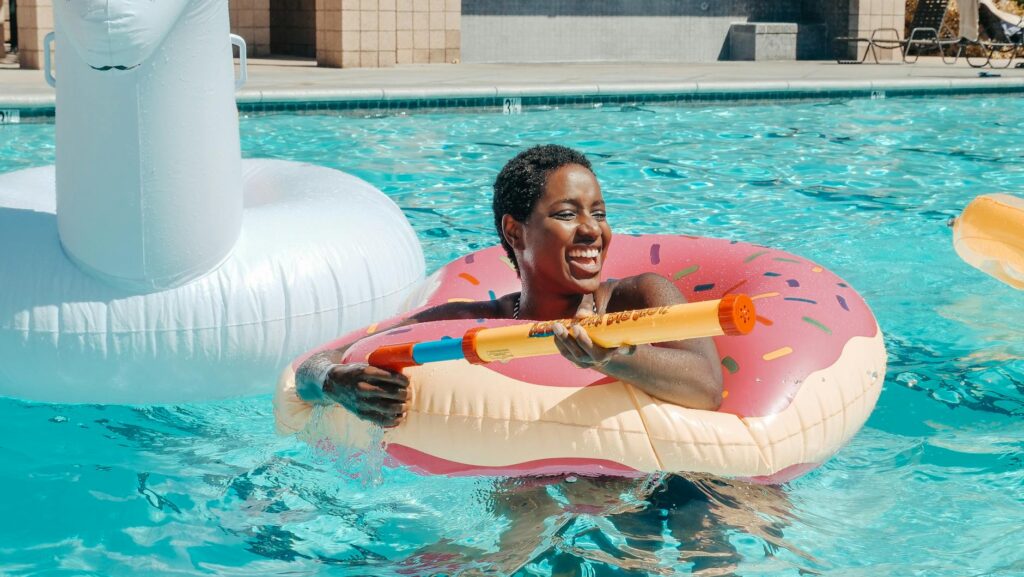 A colorful representation of outdoor pool parties during the hot summer months. — best time to visit Las Vegas