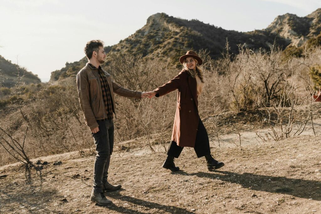 A couple enjoying a budget-friendly activity, like a scenic walk on the Strip. — budget-friendly Las Vegas trip