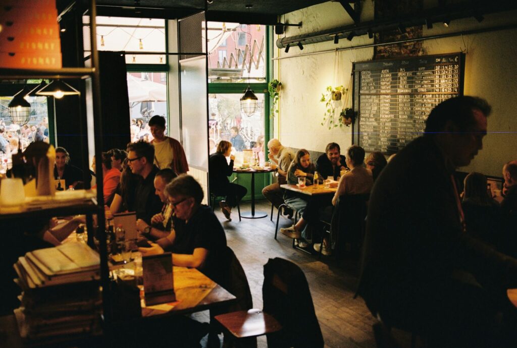 A cozy brunch spot in Las Vegas with a lively atmosphere, featuring guests enjoying their meals and drinks. — best brunc…