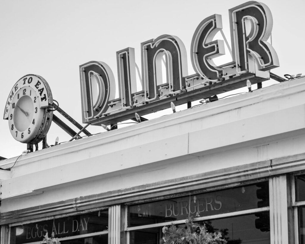 A cozy diner filled with locals enjoying breakfast in Las Vegas. — experience Las Vegas like a local