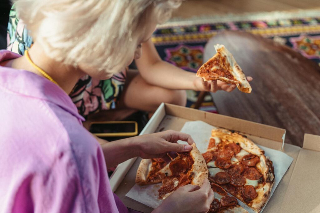 A cozy interior of the Secret Pizza Place with patrons enjoying their meals. — unique experiences Las Vegas