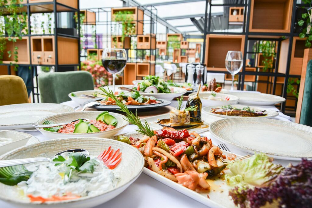 A dining scene in a lesser-known restaurant, capturing the ambiance and delicious dishes served. — off the strip attract…