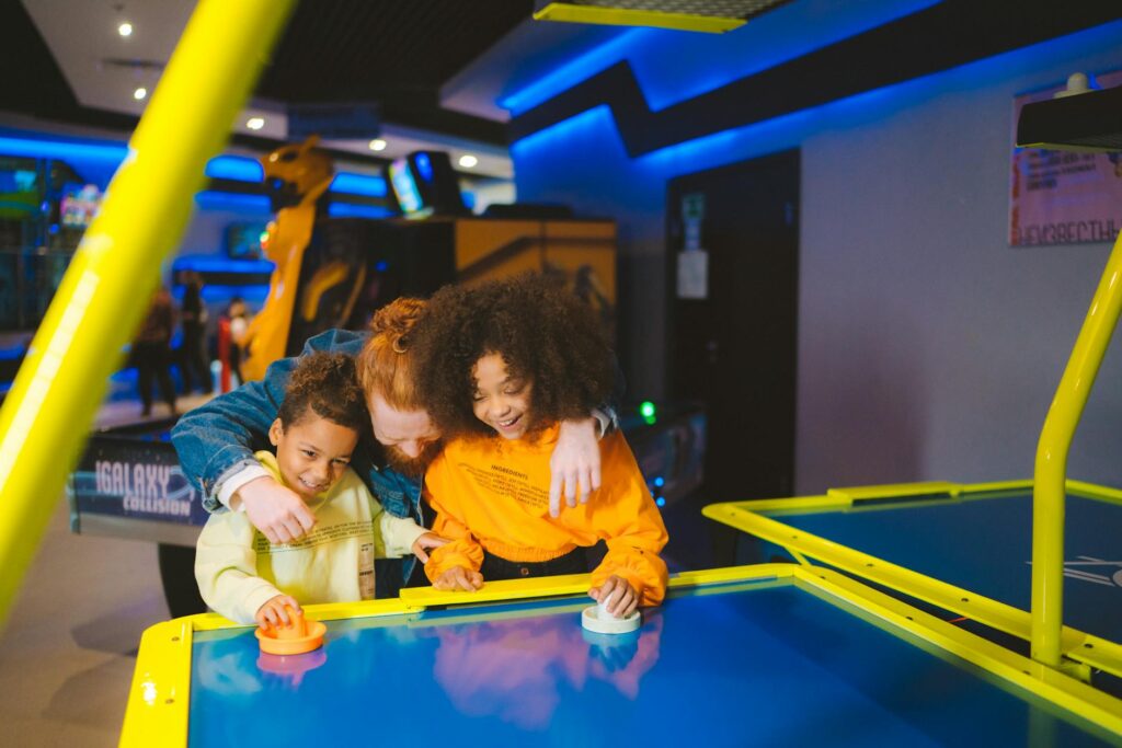 A family enjoying a fun day at a Las Vegas kids attraction, showcasing smiles and excitement. — family-friendly activiti…