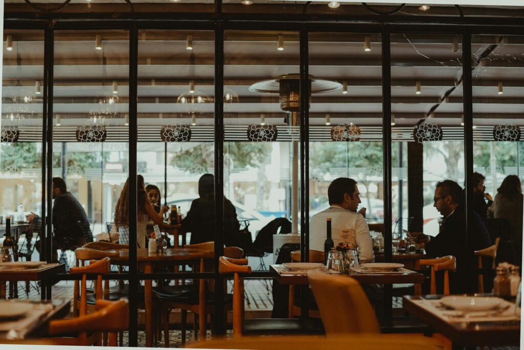 A group dining at a restaurant before attending a show — attending Vegas shows tips