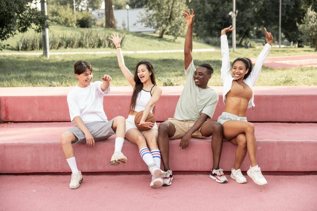 A group of friends enjoying a free outdoor show in Las Vegas — Vegas weekend getaway budget