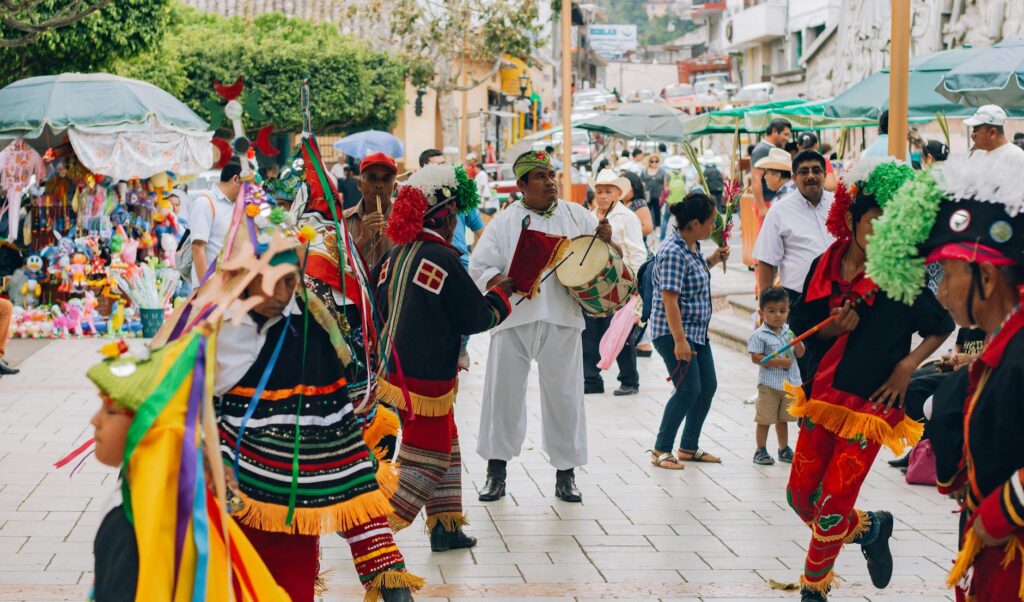 A lively scene from a free festival or market, full of people enjoying local culture. — free things las vegas
