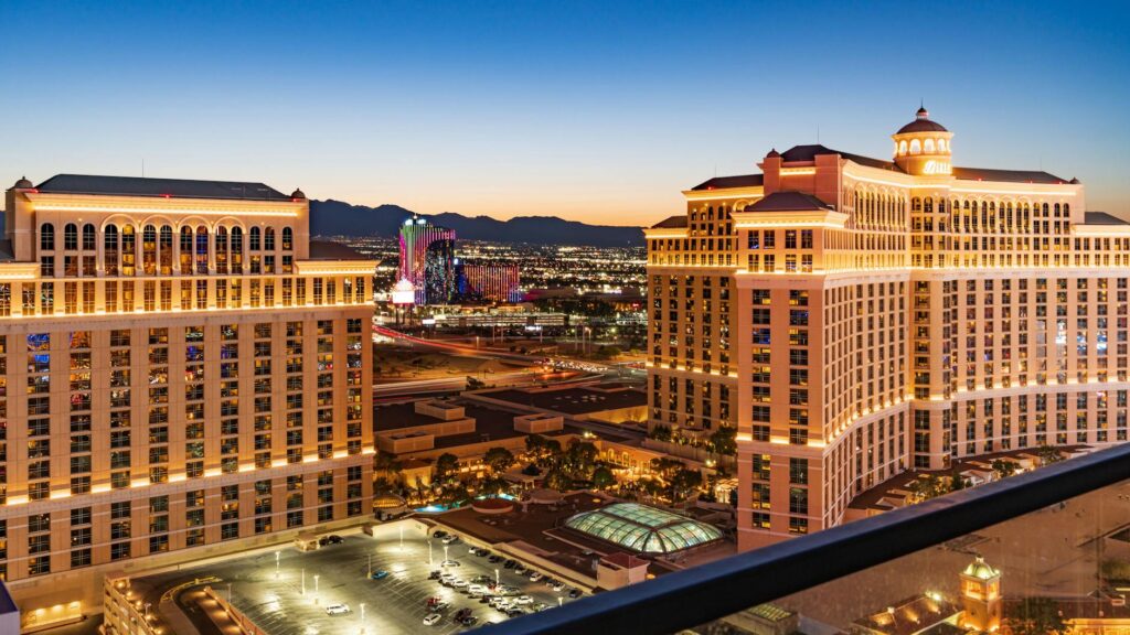 A panoramic view of the Las Vegas Strip during sunset, illustrating the vibrant atmosphere for budget travelers. — best …