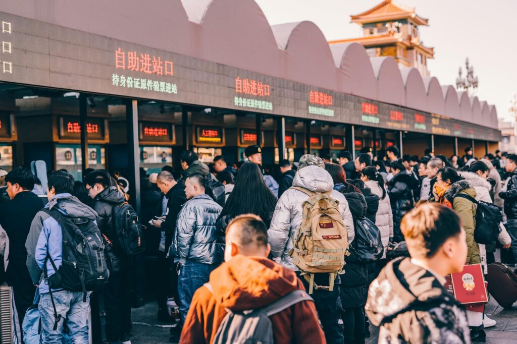 A ticket kiosk on the Strip with people waiting in line to buy show tickets. — last-minute Vegas show tickets
