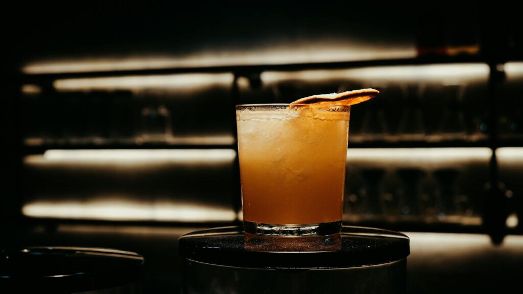 A trendy bar with cocktails being served, highlighting the upscale atmosphere of Vegas bars. — Las Vegas nightlife