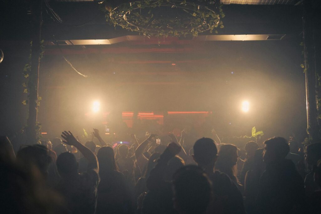 A vibrant nightclub scene in Las Vegas, showcasing crowds dancing and lights flashing. — Las Vegas nightlife