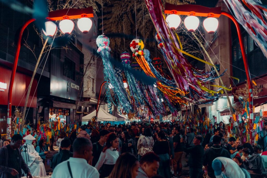A vibrant scene from a Las Vegas festival showcasing crowds and colorful decorations. — best times to visit Las Vegas