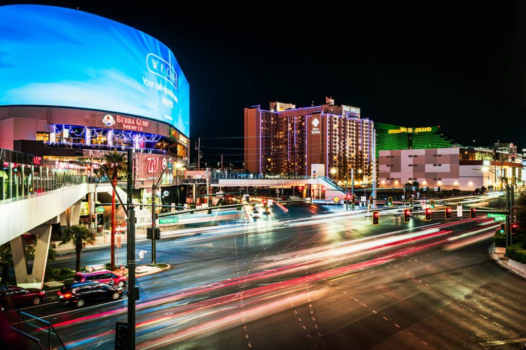 A vibrant view of Las Vegas Boulevard in spring with blooming flowers. — best time to visit Las Vegas