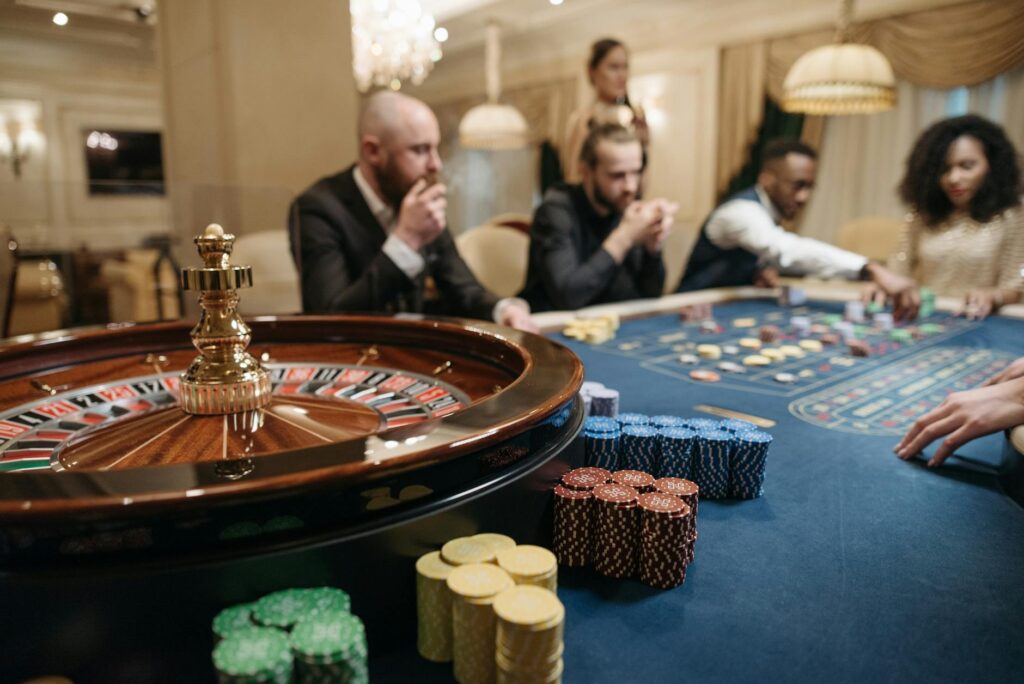 A visual of a famous casino interior, showcasing gaming tables and the lively environment. — las vegas strip guide