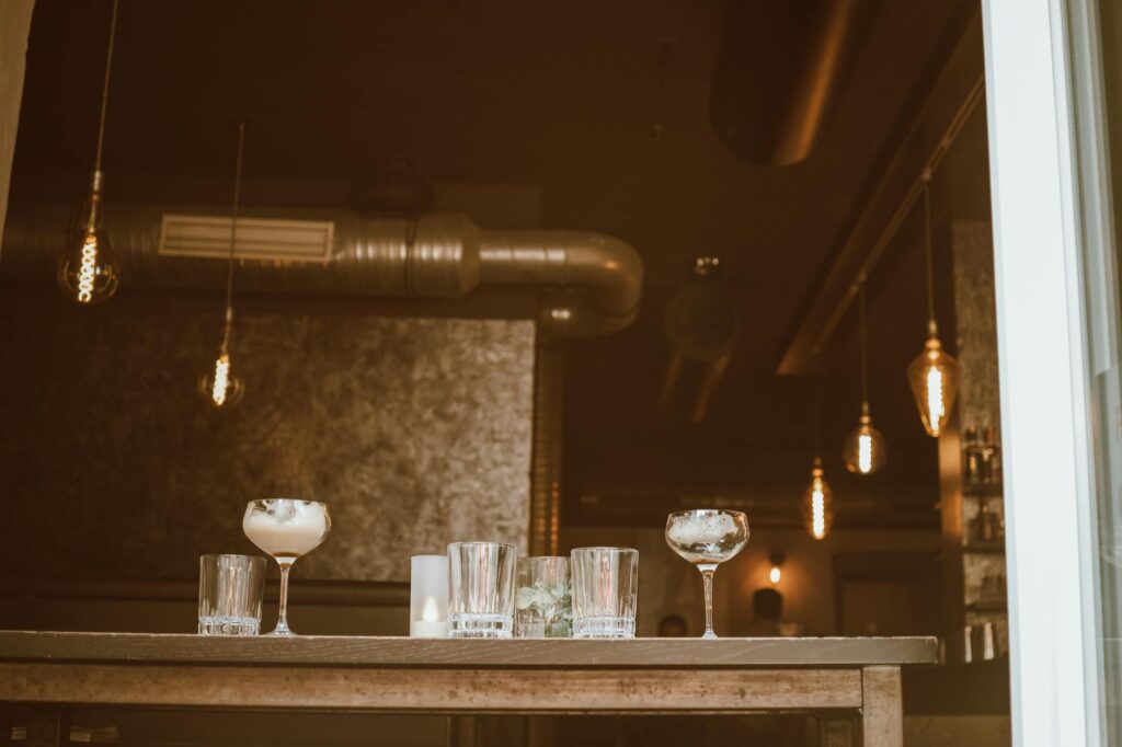 An elegant bar interior showcasing cocktails and a lively atmosphere. — Las Vegas nightlife