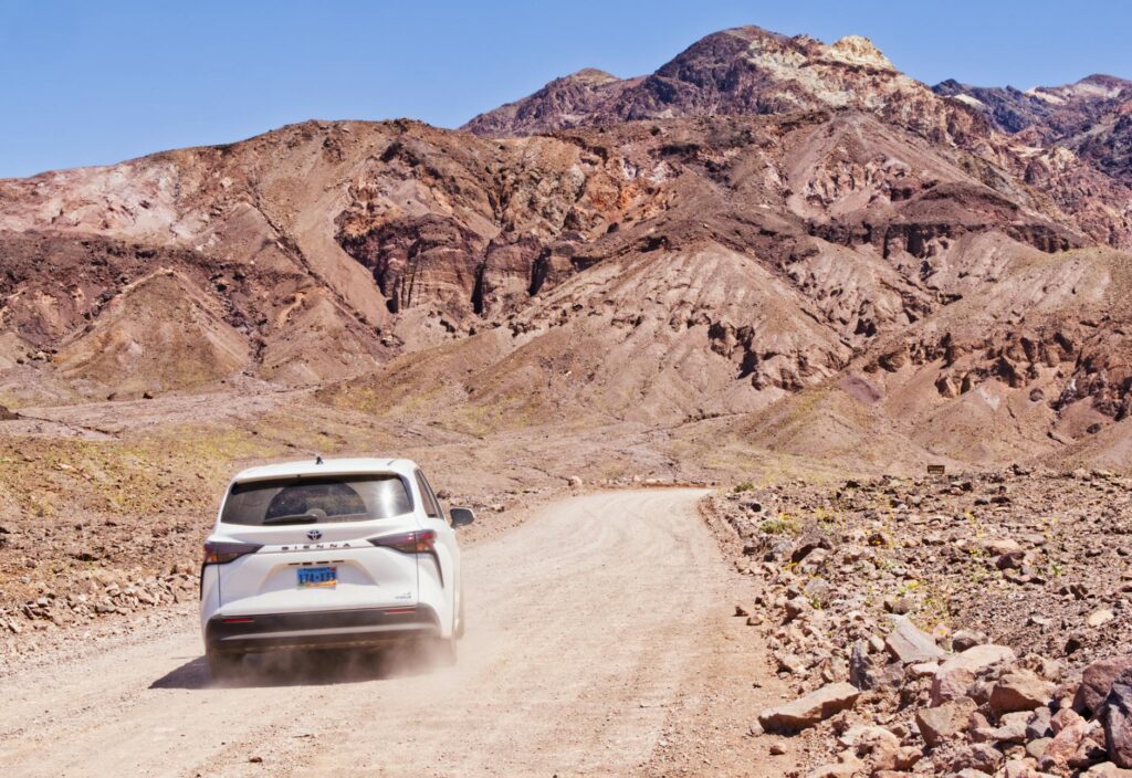 An off-road vehicle navigating through the rugged Nevada desert landscape. — unique things to do in Las Vegas
