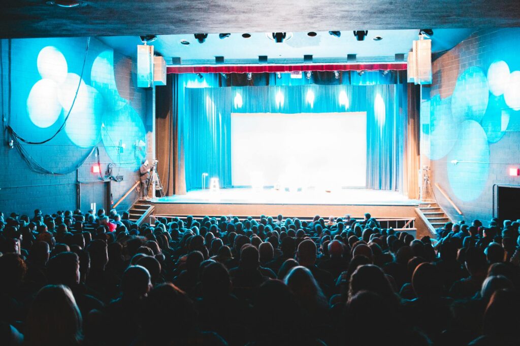 Blue Man Group performing with their signature paint and music, engaging the audience. — best shows in Las Vegas 2026