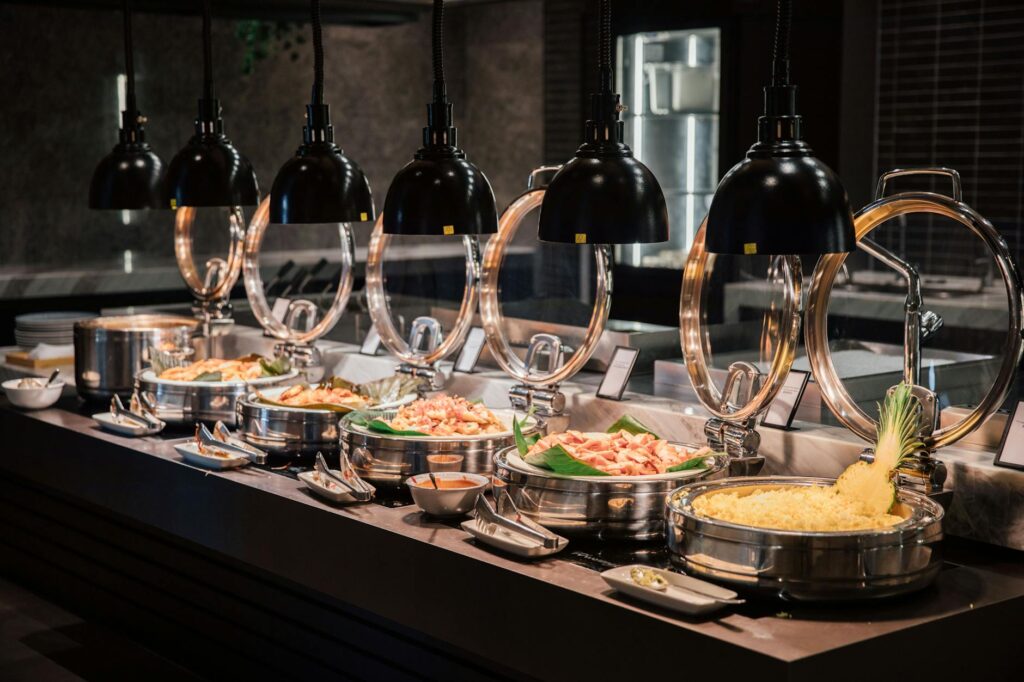 Diners enjoying a lavish buffet experience at a popular Strip restaurant, showcasing a variety of dishes. — Las Vegas St…