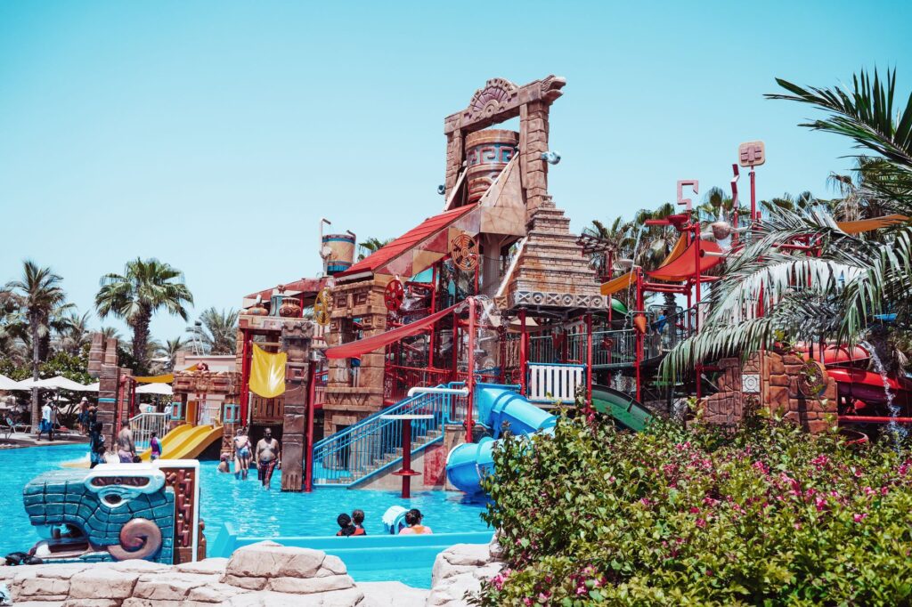 Families enjoying a day at a Las Vegas water park, splashing in the pools and slides. — outdoor activities in Las Vegas