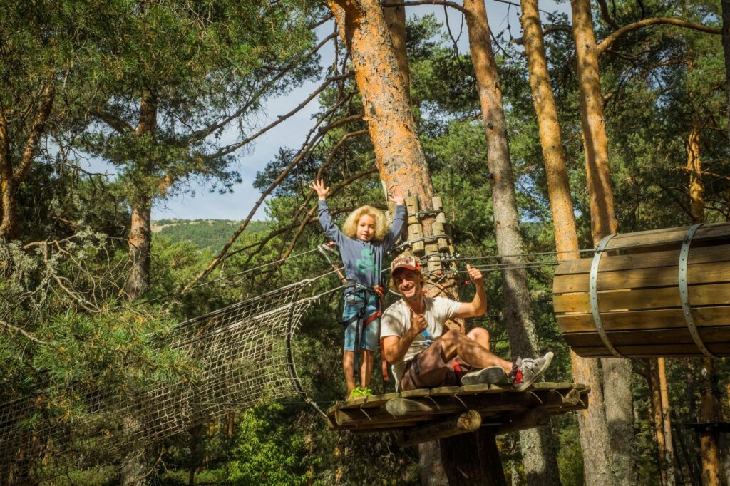 Families taking part in a fun outdoor adventure, like ziplining or hiking in Las Vegas. — family-friendly activities Las…