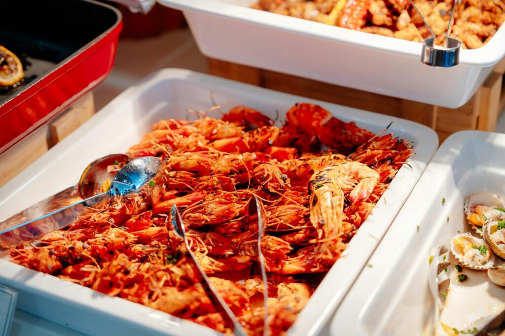Guests enjoying their meals at a lively all-you-can-eat Vegas buffet. — best buffets in Las Vegas