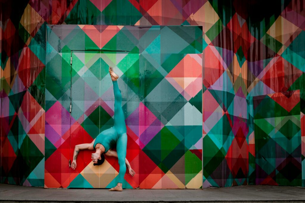 The Beatles LOVE stage filled with colorful visuals and acrobats. — best shows in Las Vegas 2026