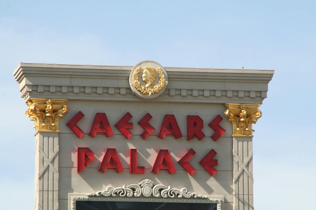 The grand entrance of Caesars Palace showcasing its Roman architecture. — Las Vegas Strip hotels