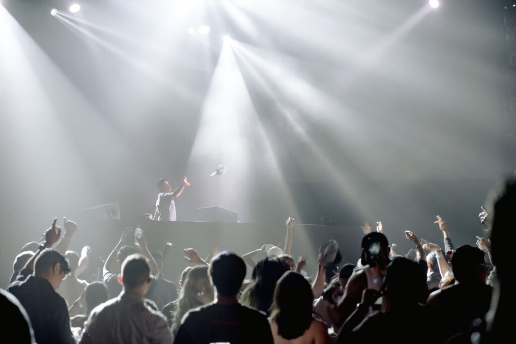 A DJ performing live at a popular Las Vegas club, showcasing the energy of the crowd. — Las Vegas nightclubs 2026