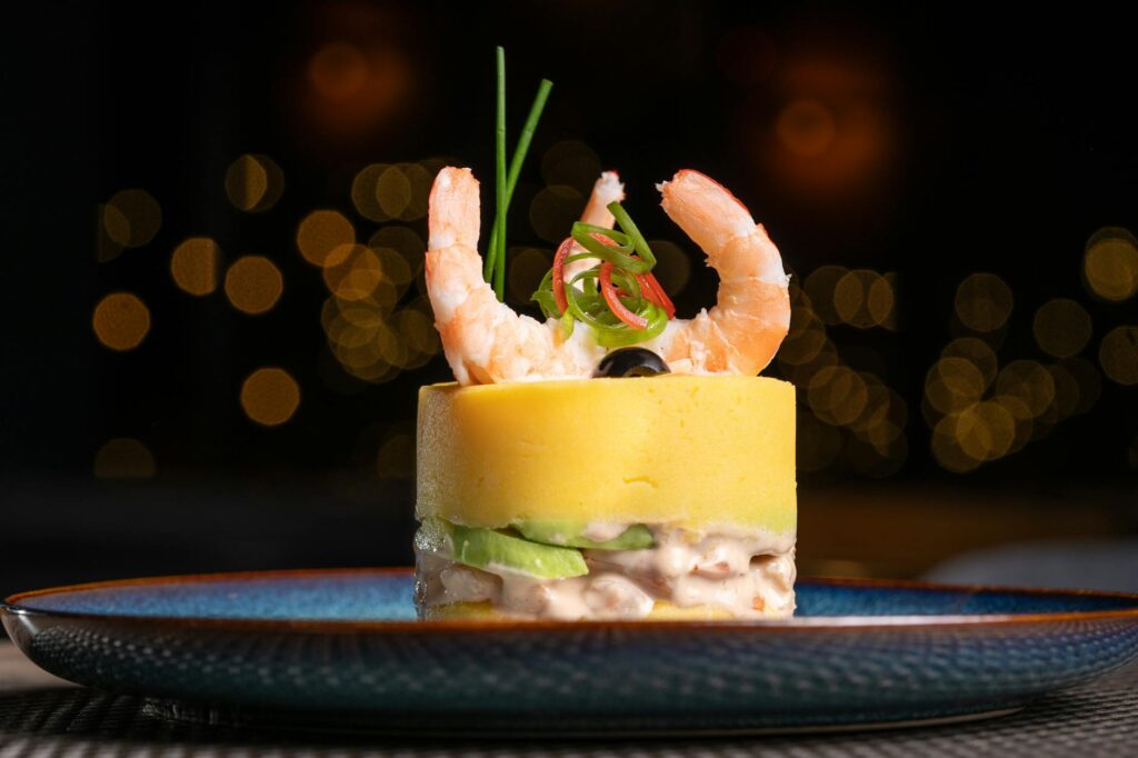 A beautifully plated dish from Restaurant Guy Savoy with a luxurious presentation — unique restaurants Las Vegas