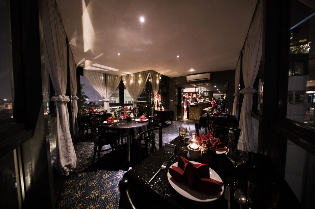 A beautifully set table at a trendy restaurant in Las Vegas, showcasing a festive bachelorette party dinner. — bachelore…