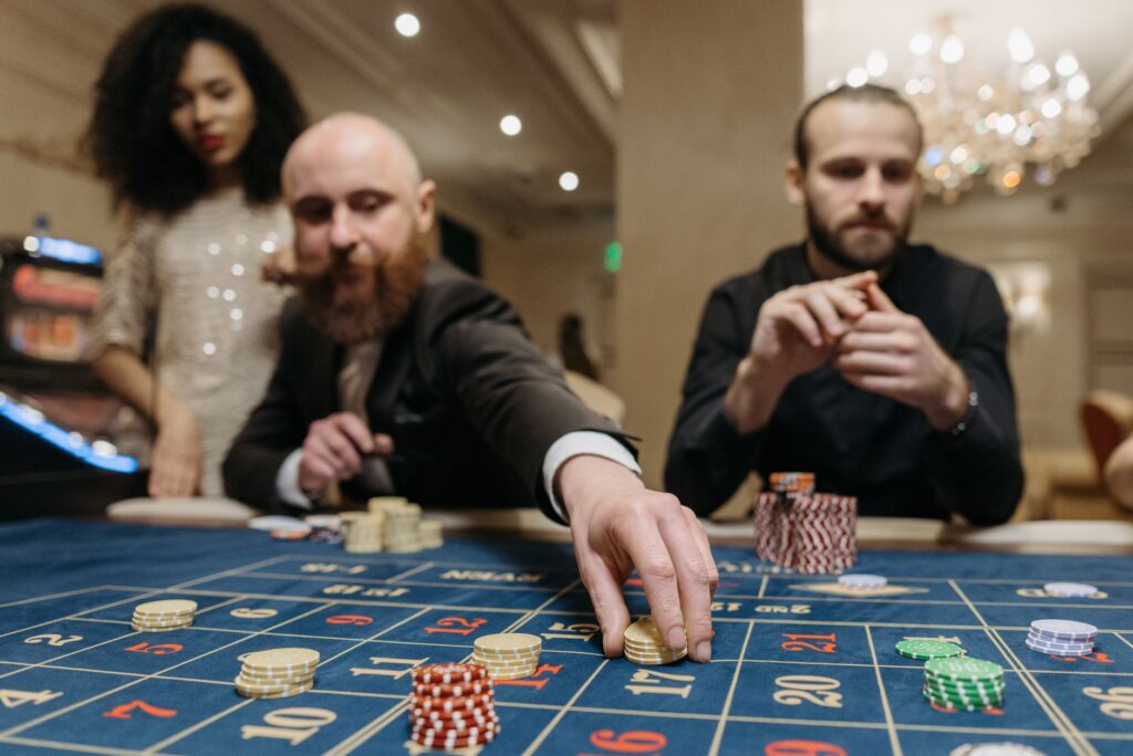 A bustling casino floor filled with players enjoying their time at the tables. — 3 day las vegas itinerary