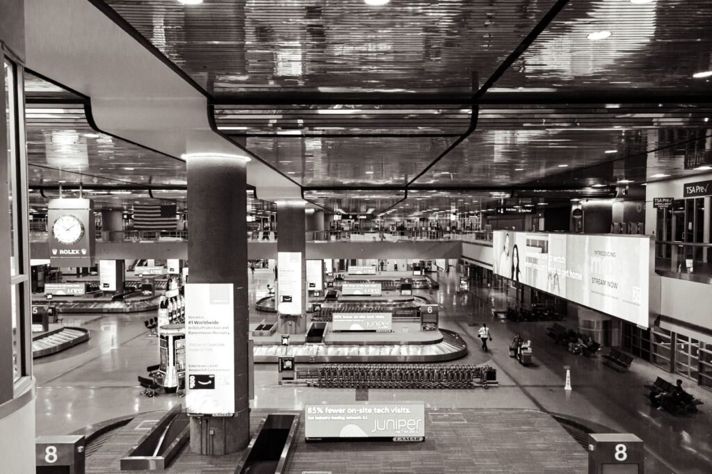 A busy Las Vegas airport terminal filled with travelers looking for cheap flights to Las Vegas.