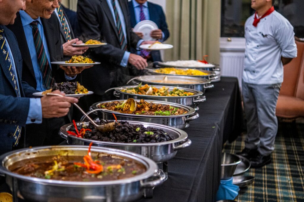 A chef explaining a dish to a group during a culinary tour — food tours in Las Vegas