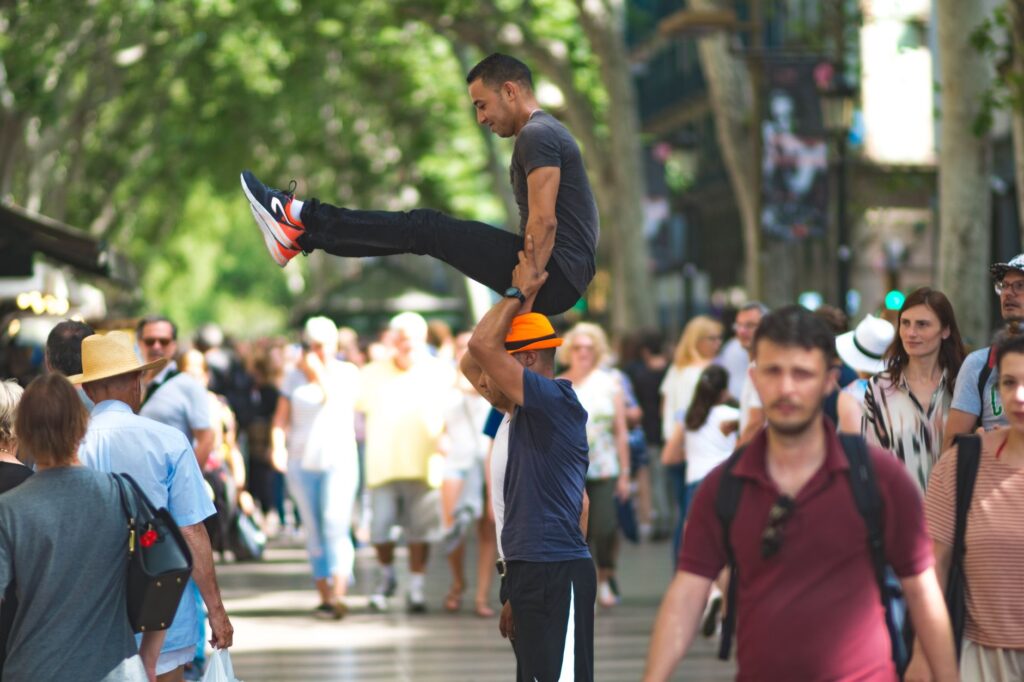 A close-up of a street performer in Las Vegas interacting with tourists. — las vegas safety tips