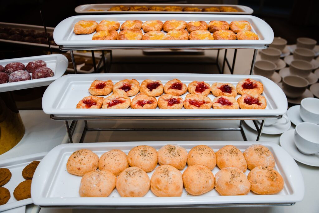A close-up shot of a dessert station filled with colorful pastries and sweets. — best buffets in Las Vegas