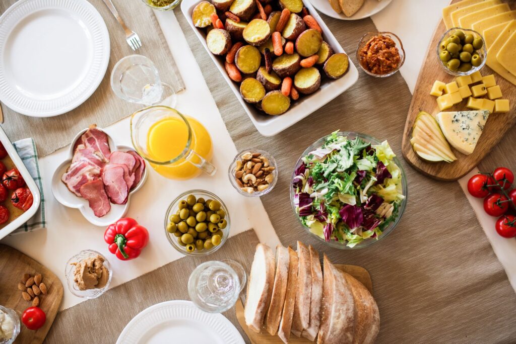 A delicious spread of food and drinks at a Las Vegas food festival showcasing local cuisines. — Las Vegas summer festivals